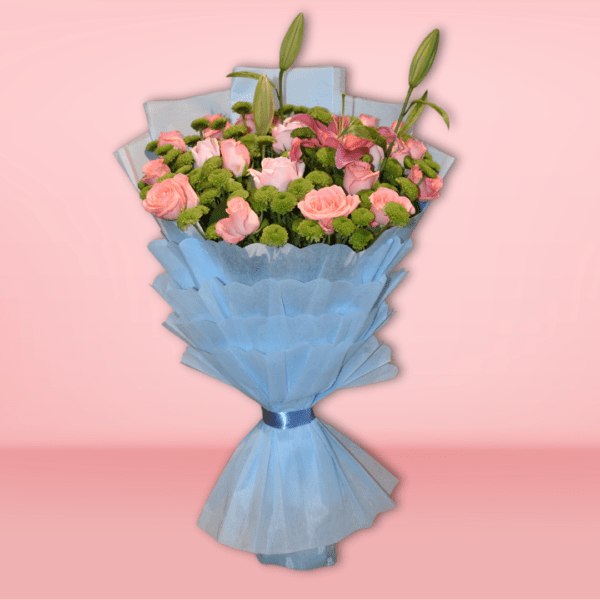 Premium pink roses and lilies bouquet delicately wrapped in blue paper