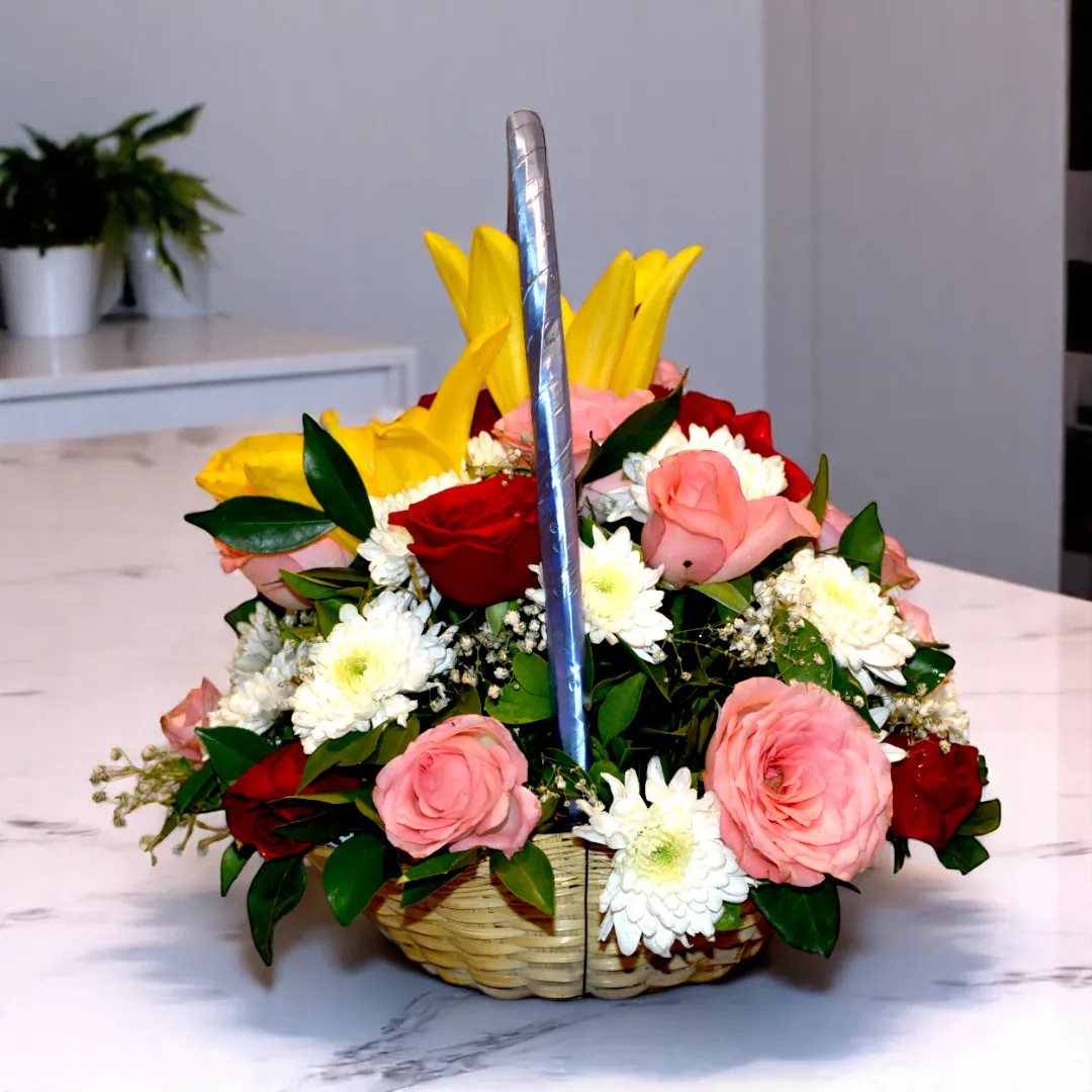 Beautiful flower basket with roses, chrysanthemum, and lily at best prices