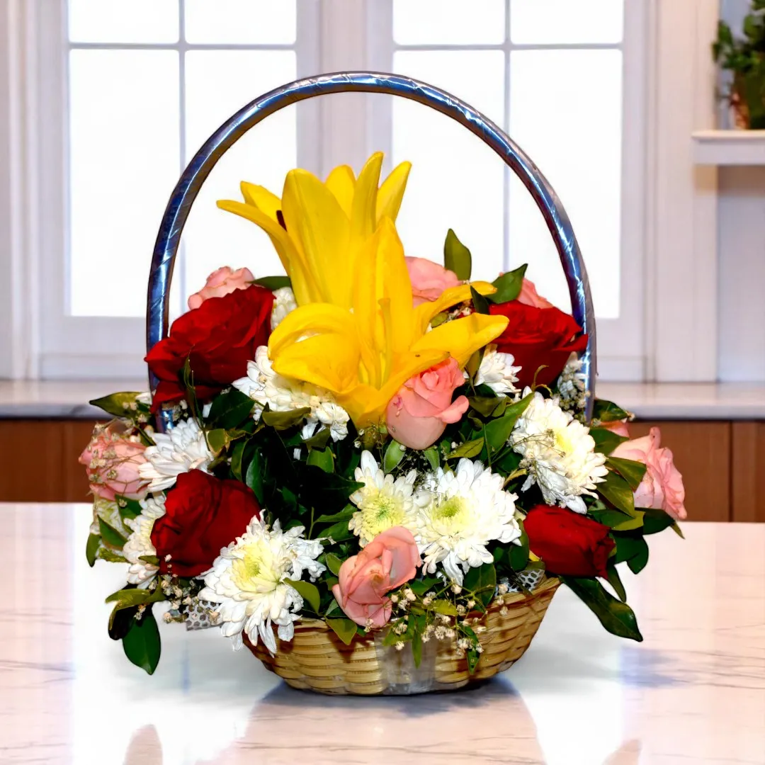 Beautiful flower basket with roses, chrysanthemum, and lily