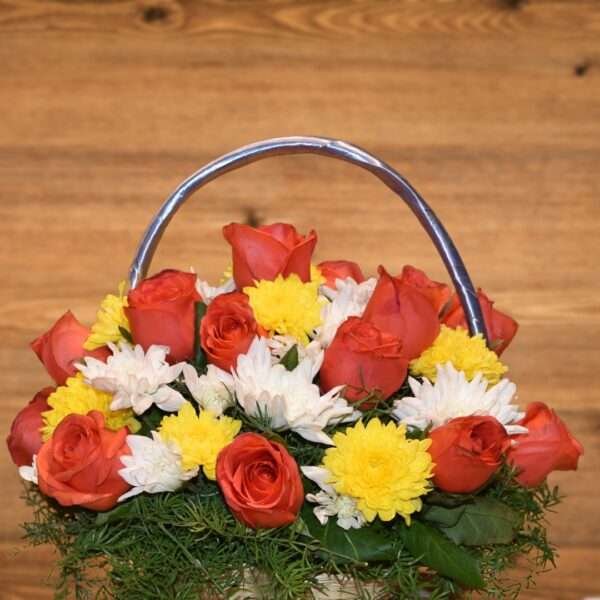 Flower Basket containing flowers such as Roses, and Chrysanthemum