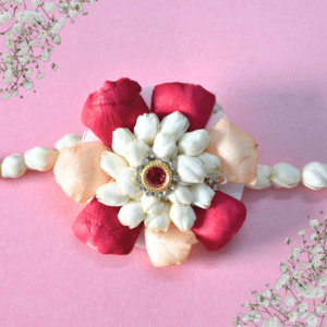 Traditional Indian flower rakhi with rose petals and jasmine flowers