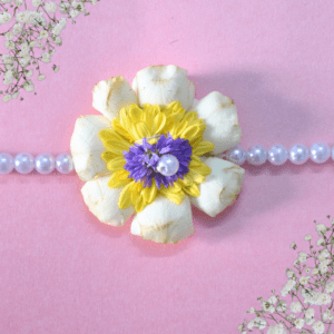 White rose petals and pearls bead rakhi