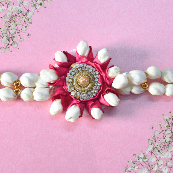 stunning rose petals & Arabian jasmine centerpiece adorned with glistening rhinestones