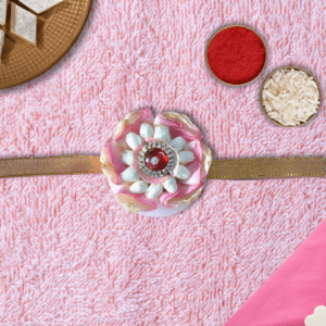 Beautiful traditional Indian flower rakhi skillfully made with rose petals and jasmine flowers