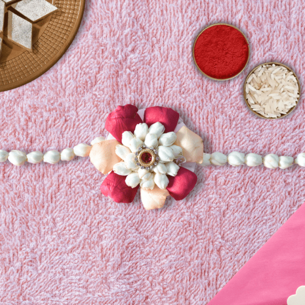 Traditional Indian flower rakhi with rose petals and jasmine flowers