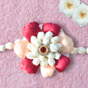 Traditional Indian flower rakhi with rose petals and jasmine flowers