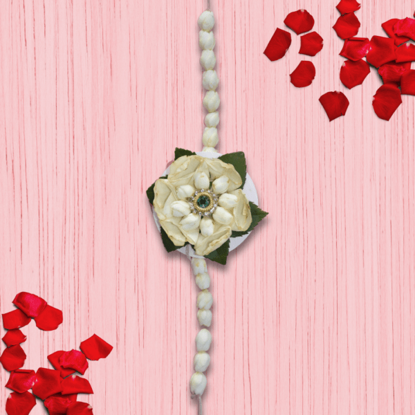 Eco-friendly white floral Rakhi handcrafted with fresh flowers and a central gem