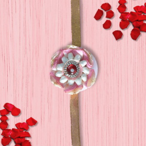 Beautiful traditional Indian flower rakhi skillfully made with rose petals and jasmine flowers