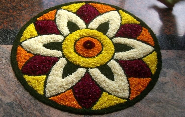 Rangoli made from the petals of the flowers