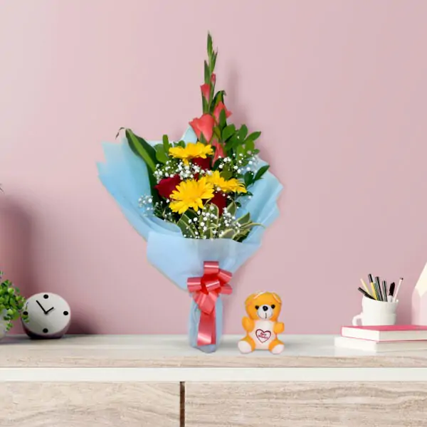 Colorful mixed flower bouquet with Gerberas, roses, gladioli, and baby's breath