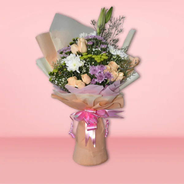 A beautiful bouquet featuring a variety of vibrant flowers, including roses, chrysanthemums, and baby's breath, wrapped in soft pastel paper and tied with a pink ribbon.