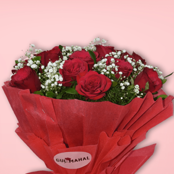 Elegant red rose bouquet with baby's breath wrapped in red paper