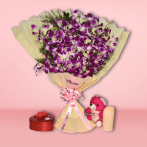 Purple orchid bouquet in cream wrapping with pink ribbon