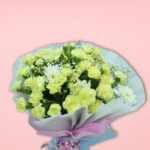 Vibrant yellow flower bouquet with carnations and baby's breath, wrapped in white and pastel paper, on pink background