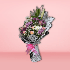 Exquisite flower bouquet with lilies, roses, and chrysanthemums. Order fresh flower baskets in Hyderabad with quick delivery for all occasions.