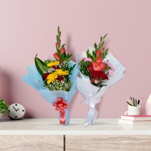 Colorful mixed flower bouquet with Gerberas, roses, gladioli, and baby's breath