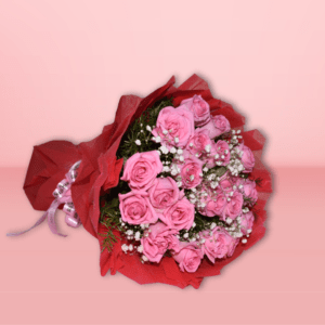 A bouquet of fresh pink roses surrounded by baby's breath and wrapped in red paper, perfect for special occasions.