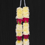 beautiful pooja garlands made with white Chamanti and red rose