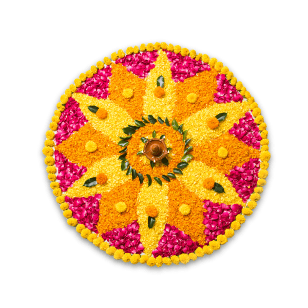 Beautiful flower rangoli design made from yellow and orange marigold, pink roses, mango leaves