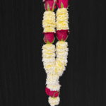 beautiful pooja garlands made with white Chamanti and red rose