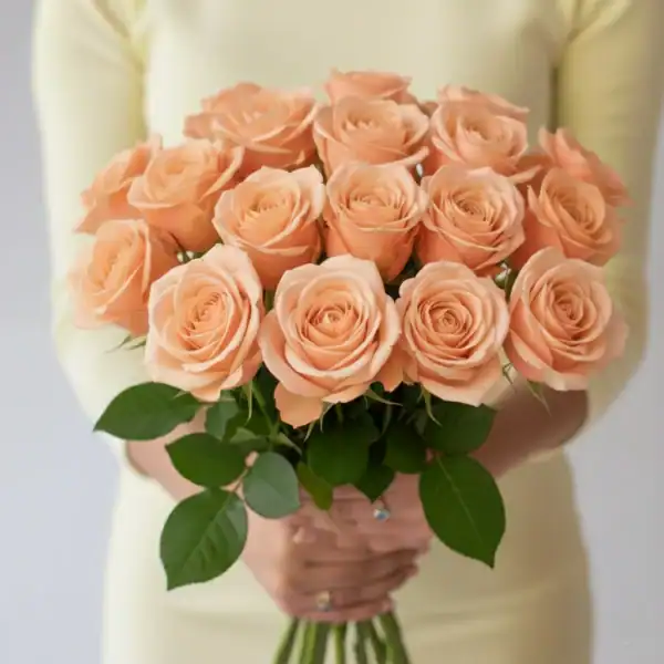 Peach Roses held in hands