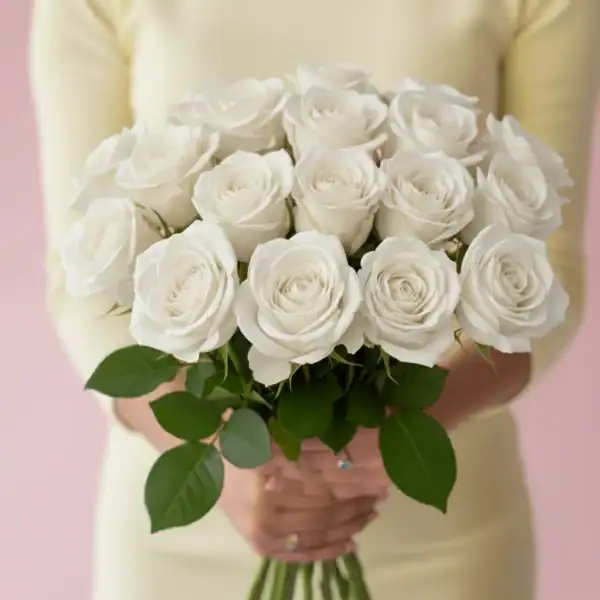 White Roses held in hands