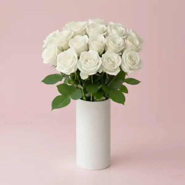 White Roses in a vase beautifully arranged
