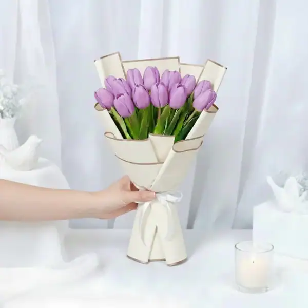 Purple tulips bouquet wrapped beautifully