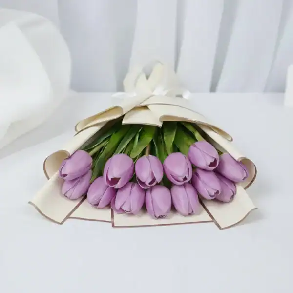Purple tulips bouquet wrapped in beautiful korean paper