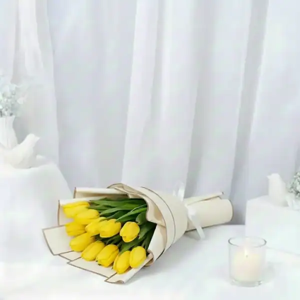 Yellow tulip flowers bouquet wrapped beautifully in Korean Paper