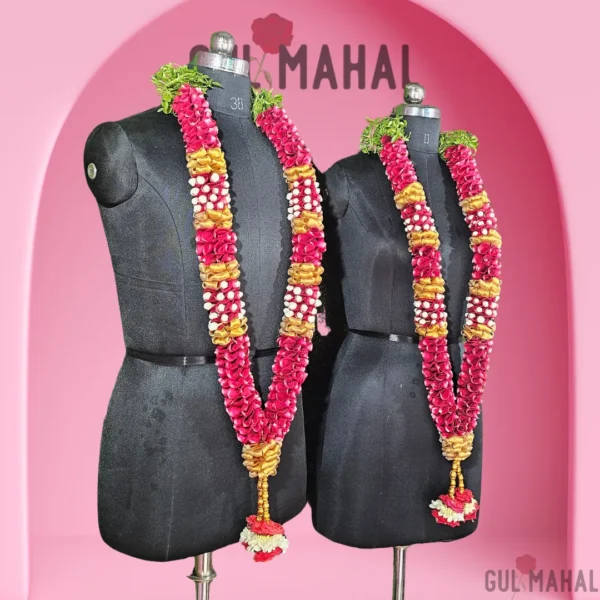 A pair of Beautiful rose petals garland for bride and groom