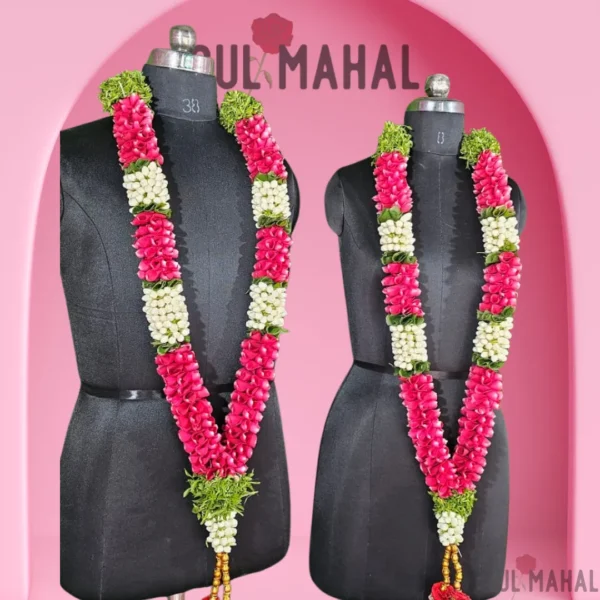 A pair of Elegant rose Bride and Groom wearing rose petals & jasmine garland & jasmine garland for bride and groom for wedding/reception/engagement