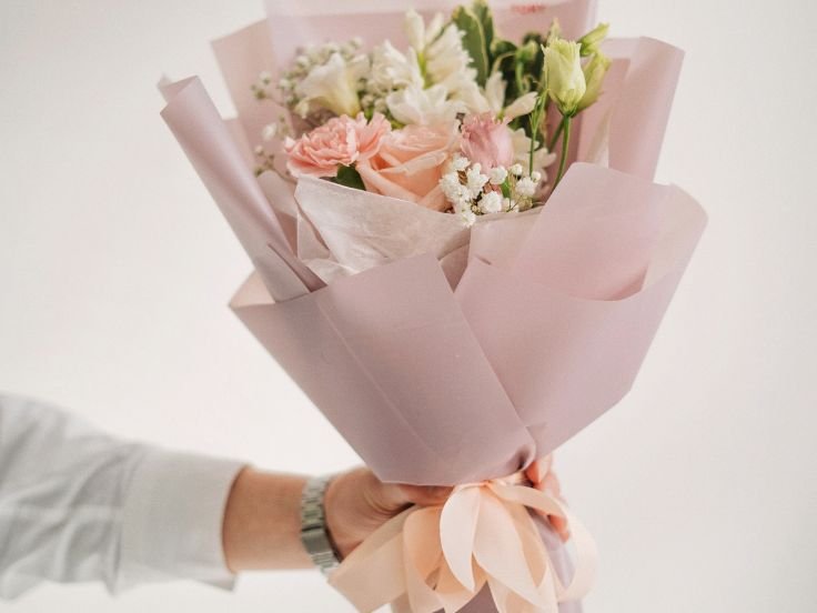 Beautiful rose bouquet with mixed colors symbolizing love, joy, and gratitude.