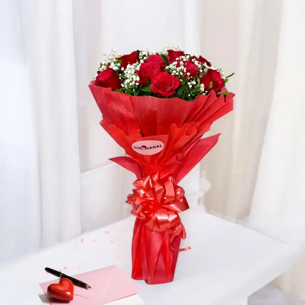 Elegant red rose bouquet with baby’s breath wrapped in premium red paper