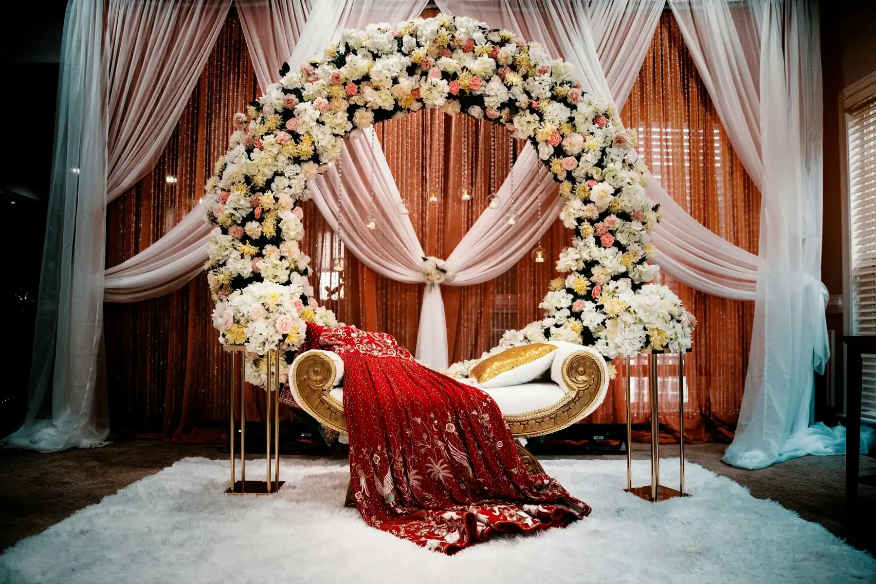 Elegant wedding stage flower decoration with floral arch and bridal seating