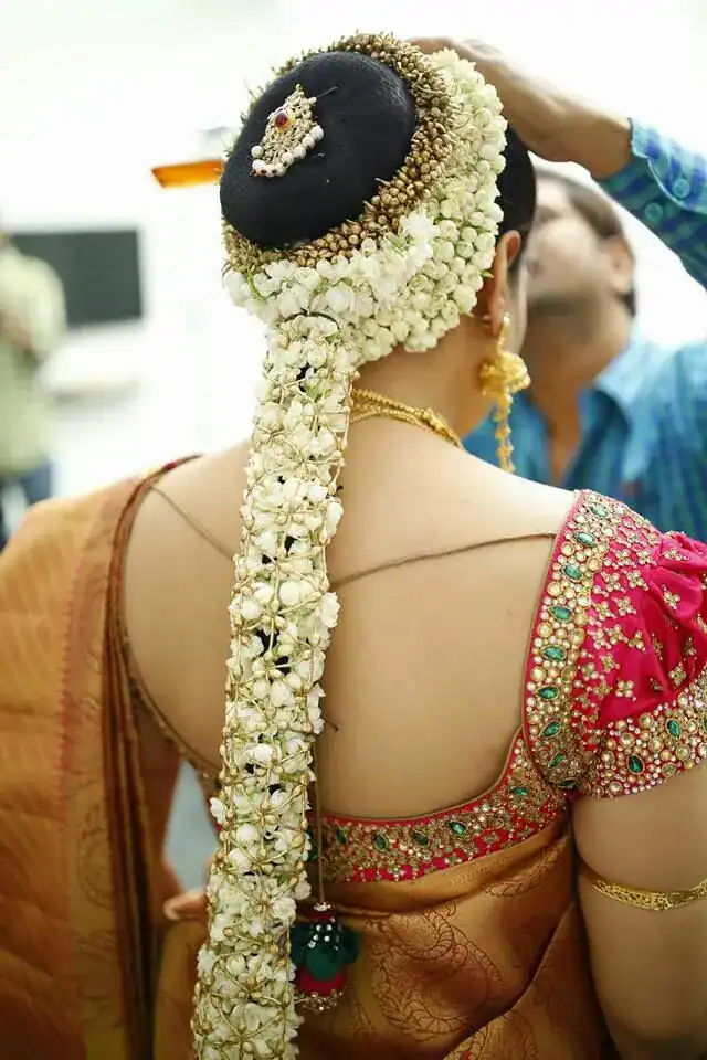 Jasmine holds a important place in Indian floral jewelry. And widely used by women as gajra as shown in the picture.