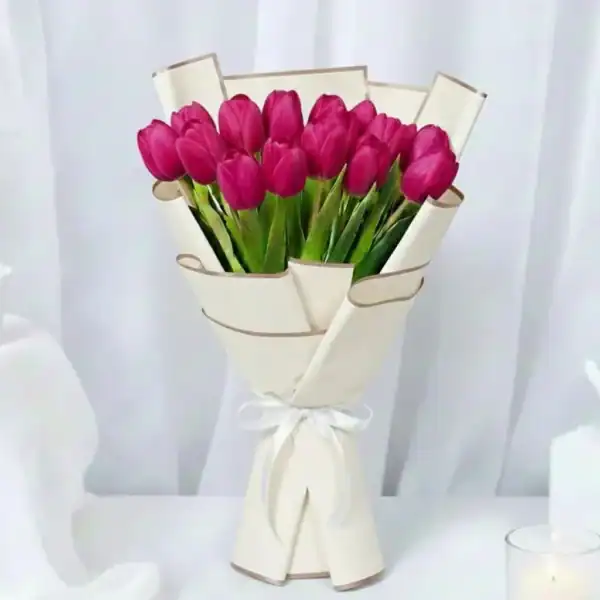 Dark Pink tulips bouquet wrapped beautifully