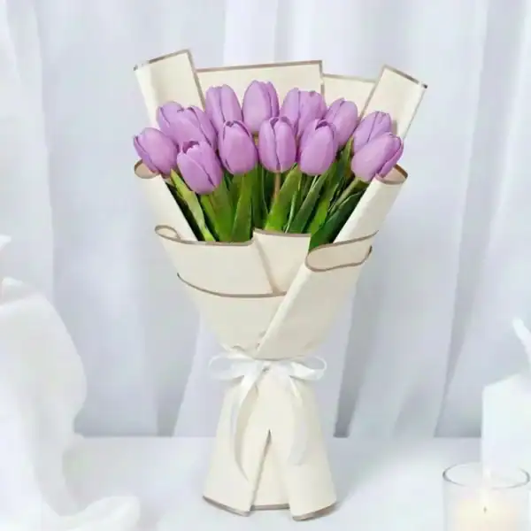 Purple tulip flowers bouquet wrapped beautifully in Korean Paper