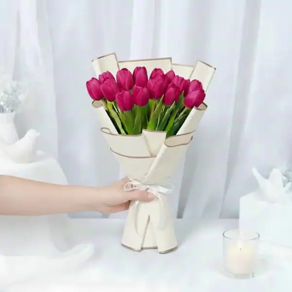 Dark Pink tulip flowers bouquet wrapped beautifully