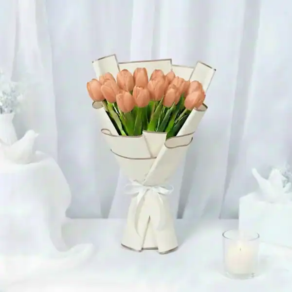 Peach tulips bouquet wrapped in beautiful korean paper
