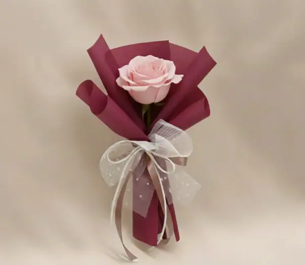 Pink Rose Bouquet Wrapped beautifully in paper