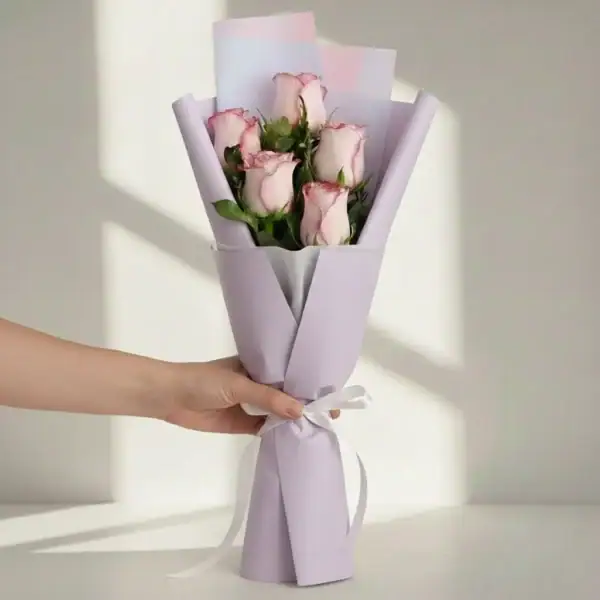 Pink Roses Bouquet held in hand