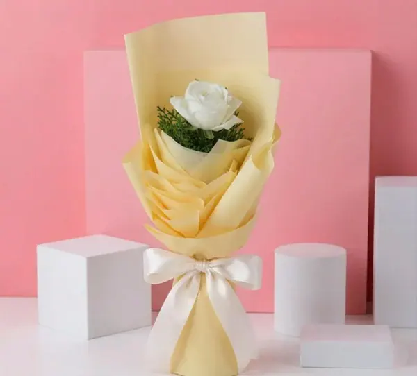Single Stem White Rose Bouquet Wrapped Beautifully in paper