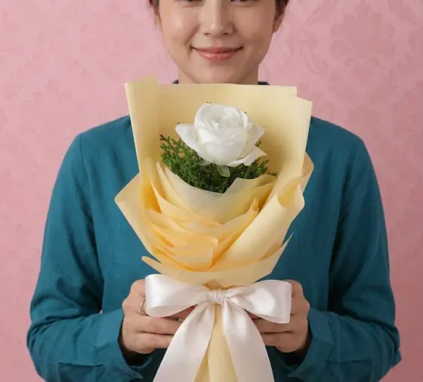 Single Stem White Rose Bouquet held in hands